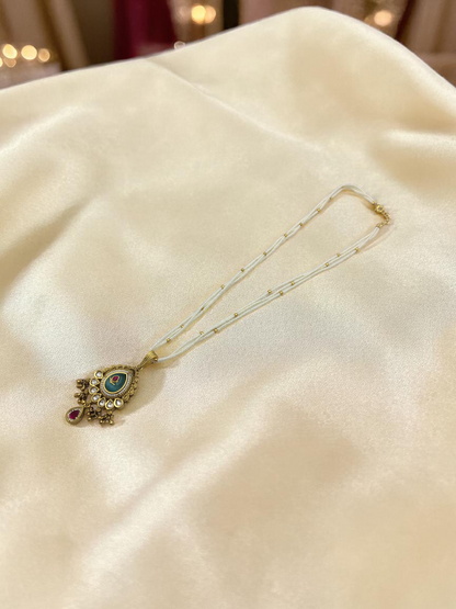 HERITAGE TEMPLE PEARL CHAIN PENDANT SET WITH GREEN TEARDROP & PINK STONE