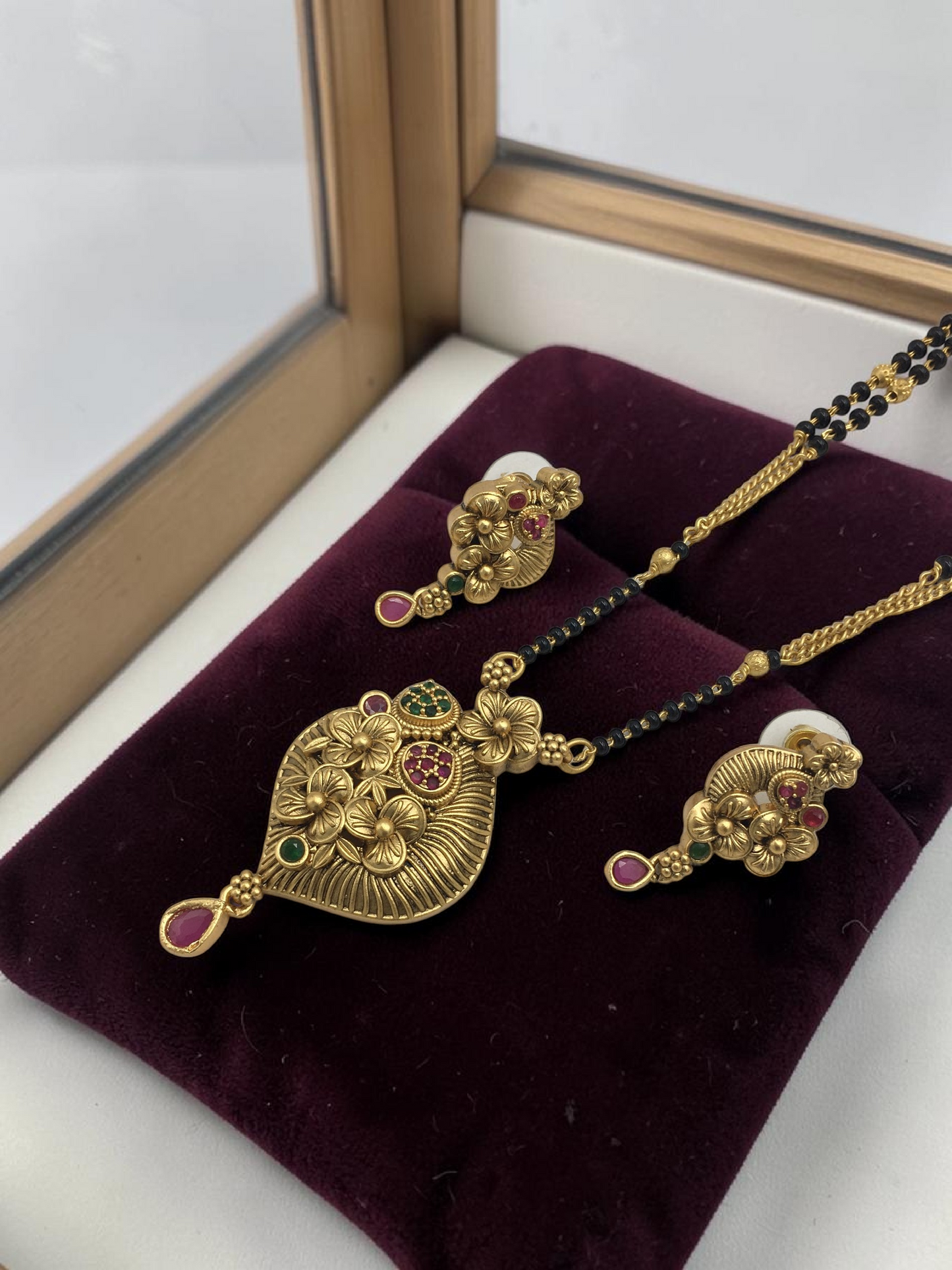 HERITAGE RAJWADI LEAF FLORAL MANGALSUTRA WITH DESIGNER STONE WORK