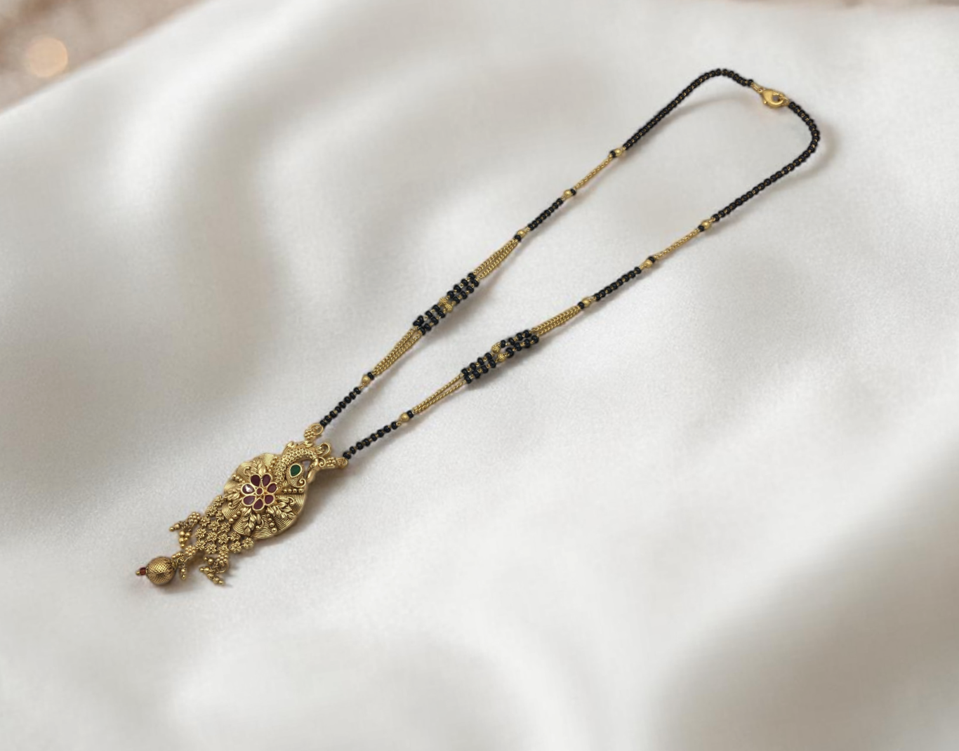 HERITAGE RAJWADI PEACOCK DESIGN MANGALSUTRA WITH STONE DETAILING
