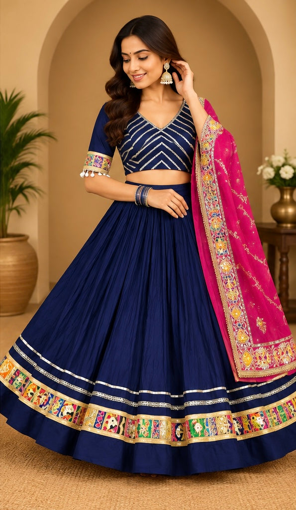 Woman wearing Rangrez navy blue and Rani Pink Navratri Chaniya Choli